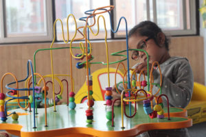 Child engaging in creative activity