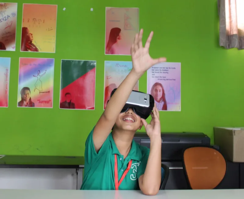 Student exploring virtual reality with a VR headset